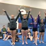 All-around winners from the Sequim-Port Angeles combined prep squads gymnastics win over Kingston on Dec. 20 are, from left, Sequims Gracie Sharp, Port Angeles Aiesha LaTourette, Sequims Emma Sharp and Sequims Lesae Pfeffer. Photo by Jackie Mangano