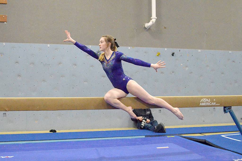 Sequims Danica Pierson competes on the balance beam during a meet with Kingston on Dec. 20. Photo by Jackie Mangano
