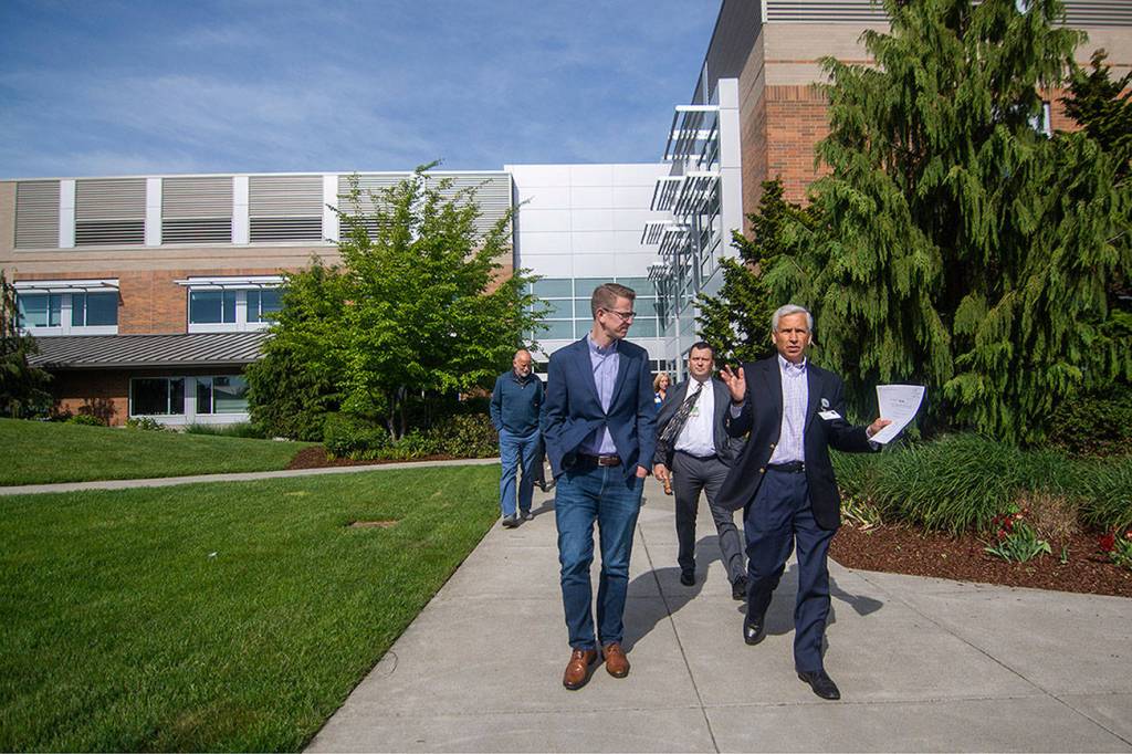 U.S. Rep. Derek Kilmer, left, and Olympic Medical Center CEO Eric Lewis walk through OMCs Sequim Campus in May. A federal judge ruled in September in favor of OMC and other hospitals that disputed a Centers for Medicare and Medicaid Services (CMS) rule that would have cost OMC $47 million over the next 10 years. File photo by Jesse Major/Olympic Peninsula News Group