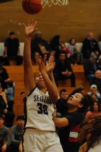 Jayla Julmist, 30, pictured facing Neah Bay on Dec. 4, lead the scoring for the Sequim Wolves in the Cloud 9 Classic tournament on Dec. 27-28, with 29 points across their two games. Sequim Gazette file photo by Conor Dowley