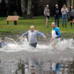 Taking the plunge: About 100 start new year with Hollywood Beach splash