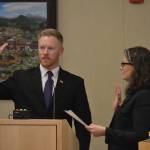 Troy Tenneson is sworn into office on Jan. 13 by Sequim City Clerk Sara McMillon. Sequim Gazette photo by Matthew Nash