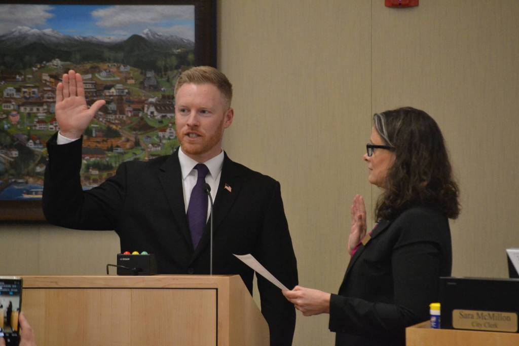 Troy Tenneson is sworn into office on Jan. 13 by Sequim City Clerk Sara McMillon. Sequim Gazette photo by Matthew Nash