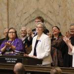 Rep. Laurie Jinkins, D-Tacoma, is applauded by her colleagues on Jan. 13 as she becomes the first woman in Washington state history to serve as Speaker of the House. Photo by Cameron Sheppard/WNPA News Service
