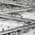 People navigate the snow-covered zig-zag ramp at Oak Street in downtown Port Angeles on Wednesday. Photo by Keith Thorpe/Olympic Peninsula News Group