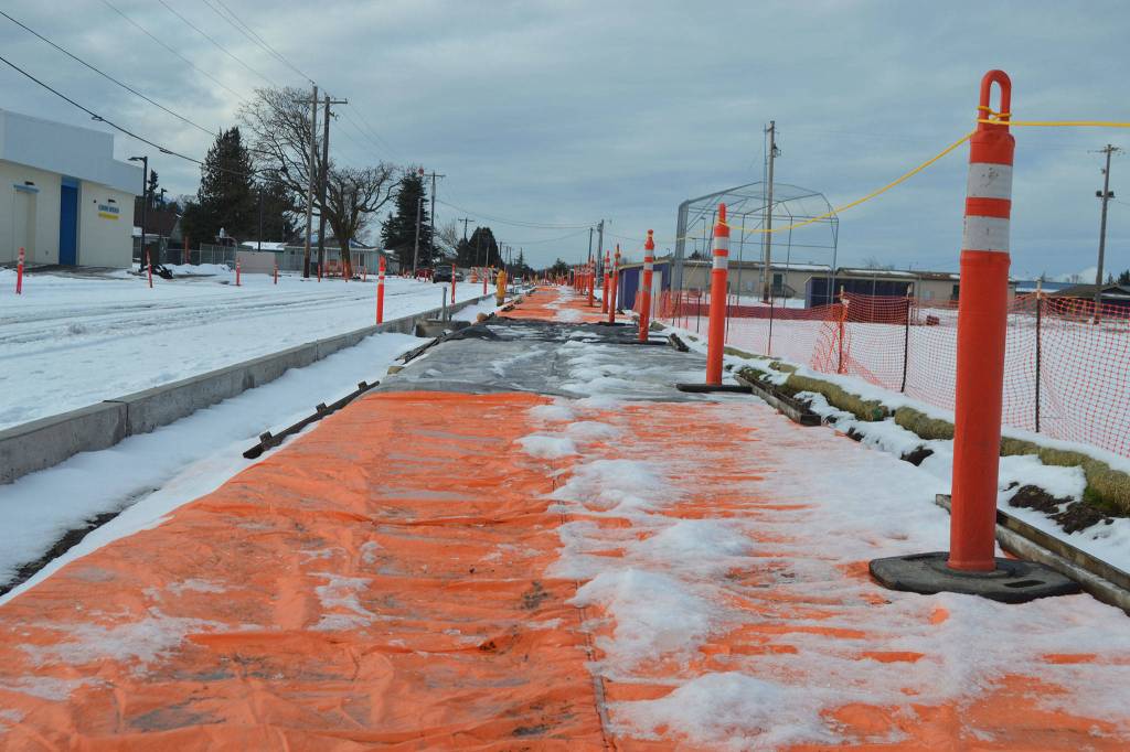 Paving along West Fir Street is anticipated for Spring Break in late March/early April with the project set to finish between late April and late May, dependent on weather, city staff said. Last week snow stopped construction for the whole week. Sequim Gazette photo by Matthew Nash