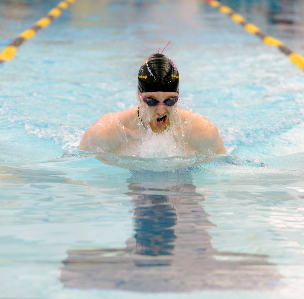 Sequim High senior Jesse Bobst swims the breaststroke portion of the 200 medley relay to kick off Sequims league win over Klahowya on Jan. 23. The Wolves swept all three relays en route to a 90-59 win. Sequim Gazette photo by Michael Dashiell