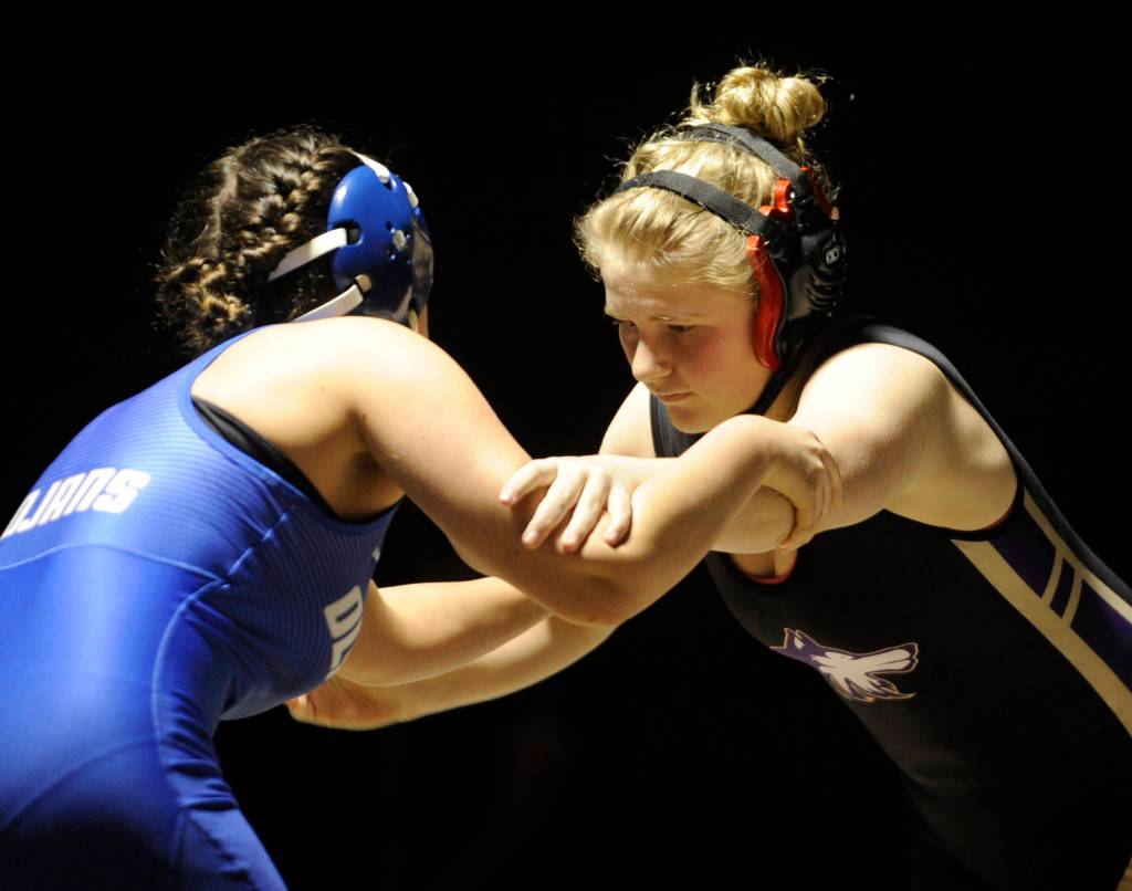 Sequims Petra Bernsten, right, takes on Olympics Alessia Arpetti in an exhibition match on Jan. 23 in Sequim. Bernsten won with a second period pin. Sequim Gazette photo by Michael Dashiell