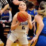 Sequim Wolves guard Hannah Bates sets up to take a shot in the first quarter of the Wolves 85-16 win over the Bremerton Knights on Jan. 24. Bates scored 15 points off the bench with impressive defense, snagging seven steals. Sequim Gazette photo by Conor Dowley