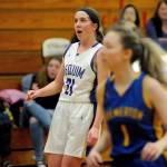 Sequim Wolves guard Kalli Wiker reacts to hitting a long 3-point shot in the first quarter of the Wolves 85-16 win over the Bremerton Knights on Jan. 24. Wiker scored 11 points against the Knights, including three 3-pointers. Sequim Gazette photo by Conor Dowley
