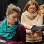 Charisa Silliman, left, and Sarah Shea imagine a cold winter march past recent graves in the segment Rocky Road. Photo courtesy of Olympic Theatre Arts