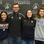 Peninsula College womens soccer players (from left) Kayla Alcott, Sam Oliveira and Halle Nottage were joined by head coach Kanyon Anderson at a signing ceremony on Jan. 24. The three players will move on to play at four-year schools next fall. Submitted photo