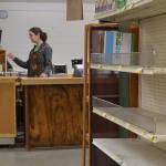 Myla Gloor-Nelson helps a customer last week inside Nashs Farm Store in Dungeness prior to it closing on Feb. 1. She worked at Nashs for 12 years starting at its old farm stand. Gloor-Nelson said she wasnt certain shed have a job after Saturday and was uncertain where shed shop next. Sequim Gazette photo by Matthew Nash