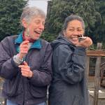 Jeanette Stehr-Green, left, and Audreen Williams have their pruning shears at the ready in the 5th Street Community Garden blueberry patch in Port Angeles. The Master Gardeners will answer pruning questions following Stehr-Greens Green Thumbs Garden Tips presentation on Feb. 13. Photo by Betty Harriman