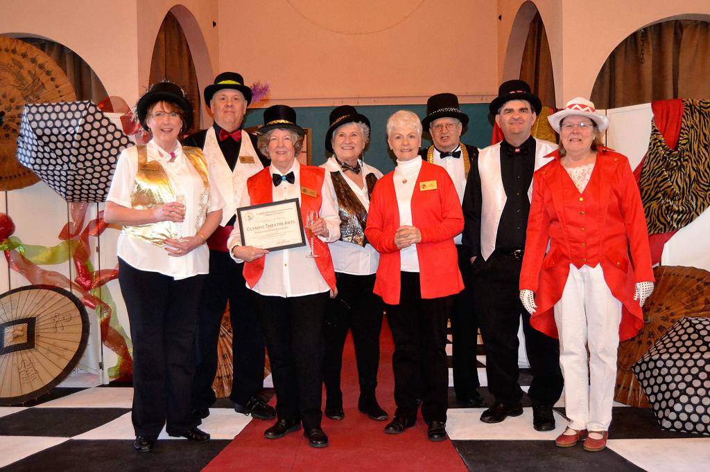 OTA board members gather during the theatres 40th anniversary to commemorate being honored as the Sequim-Dungeness Valley Chamber of Commerces Business of the Month in February. Pictured from left, are, Sara Nicholls, Steve Rodeman, Sandy Altman, Elaine Caldwell, Mary Powell, Phil Mortensen, Mike Carpenter and executive director Carol Willis. Sequim Gazette photo by Matthew Nash