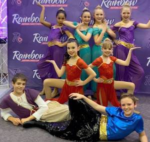 The Aspire Academy junior competitive dance team poses in their costumes at the Rainbow National Dance Competition in Seattle on Jan. 17. Photo submitted