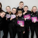 Aspire Academy competitive dance director Erica Edwards, left, and the academys junior competitive dance team stand with their awards won at the Rainbow National Dance Competition. The team consists of, from left, Madison Edwards, Ayla Alstrup, Sofia Divinsky, Noah Jackson, Becca Marshall, Cyrus Deede, Sydney Owens and Eva Lancheros-Gillis. Sequim Gazette photo by Conor Dowley