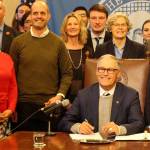 Governor signs into law tax bill to help fund higher education