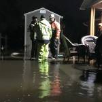 City crews, neighbors prevent flood damage