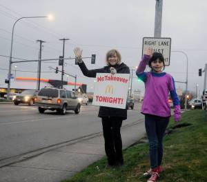 Above: Helen Haller teacher Teresa Thorson and student Camille Jefferson encourage people to take part in the Helen Haller Parent-Teacher Organizations McTakeover fundraiser at the Sequim McDonalds on Feb. 12. Shelley Jefferson, assistant principal at Helen Haller Elementary School, takes part in the Helen Haller Parent-Teacher Organizations McTakeover.