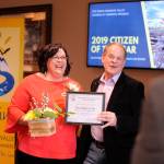 Deon Kapetan, 2019 Sequim-Dungeness Chamber Citizen of the Year, accepts her finalist award from award chair Brown Maloney at the chambers annual award ceremony at The Cedars at Dungeness on Feb. 25. Sequim Gazette photo by Michael Dashiell