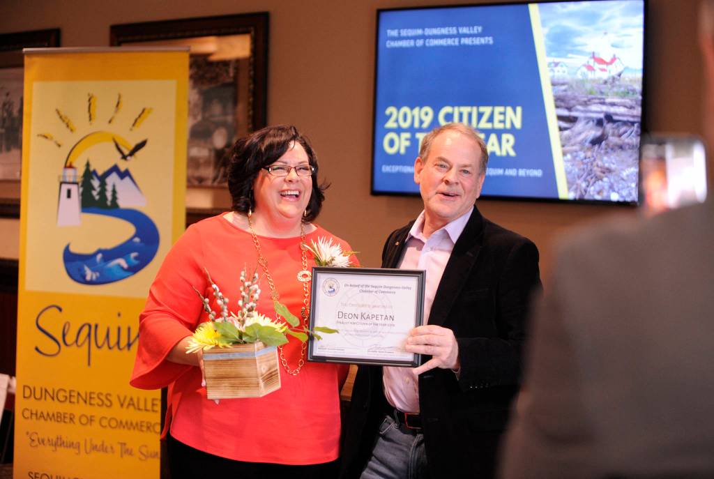 Deon Kapetan, 2019 Sequim-Dungeness Chamber Citizen of the Year, accepts her finalist award from award chair Brown Maloney at the chambers annual award ceremony at The Cedars at Dungeness on Feb. 25. Sequim Gazette photo by Michael Dashiell