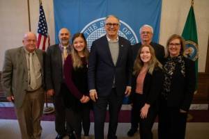 From left, Sequim School District superintendent Rob Clark, school board director Jim Stoffer, Sequim High School senior board representative Peyton Sturm, Washington State Governor Jay Inslee, board director Larry Jeffryes, SHS junior board representative Olivia Preston, and executive assistant Trayce Norman pose during a meeting between the Sequim school board representatives and the governor in Olympia on Feb. 10. Photo submitted