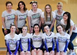 The combined Sequim-Port Angeles team takes a break from competition at the state 1A/2A/3A meet held in bellevue last week. Pictured are (back row, from left) head coach Jackie Mangano, assistant coach Rachel Sharp, Aiesha LaTourette, manager Mazie Tucker, volunteer coach Julie Haguewood and manager Mei Ying Harper-Smith, with (from left) Sequims Emma Sharp, Kori Miller, Lesae Pfeffer, Danica Pierson and Gracie Sharp. Submitted photo