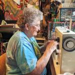 Sharon Ireton of Dragon Lady Handicrafts works on a project. Photo by Emma Jane Garcia