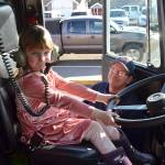 Top: Kindergartener Maddy Minard sits in a fire truck for the first time on Feb. 28 thanks to volunteer firefighter John Brygider. Maddy received the most support for the Turkey Trot for grades K-2. Below: Fourth grader Maci Evans, left, readies for a limo ride with her friends on Feb. 24 after receiving the most financial support for grades 3-5 at last Novembers Turkey Trot. Sequim Gazette photos by Matthew Nash
