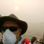 John Kuntz wears a face mask as he paddles, trying to avoid the smoke from 600 active forest fires in British Columbia. Submitted photo