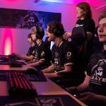 The Pirate Rocket League team of (from left) Nicholas Charters, Logan Beebe, Stuart Koehler and Drew Eckard compete, with coach Charlie Morrow looking on. The team takes on the University of Connecticut on March 11. Photo by Rick Ross
