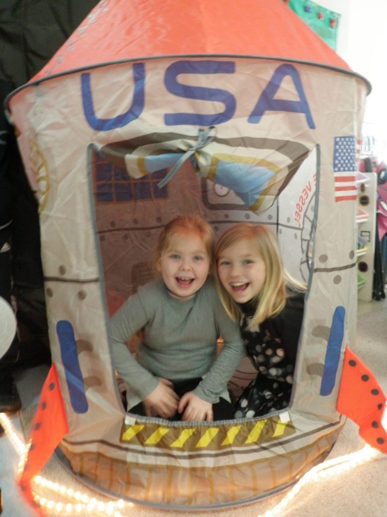 Third-graders Cayden Besana, left, and Lila Nix inside a space capsule set up in Emily Ellefsons classroom at Helen Haller Elementary School. Photos by Patsene Dashiell