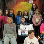 Emily Ellefsons third-graders, studying astronomy this month, are allowing their aspirations to run as far as the stars in the sky. One thing they are thinking about is if they would choose a mission to the moon or Mars.