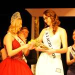 Sydney VanProyen receives the Miss Congeniality award from last years winner Brianna Cowan. She was chosen by fellow contestants for her friendliness and willingness to help others.