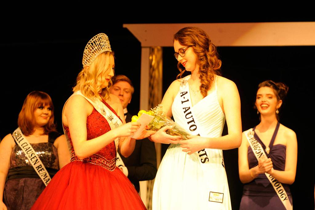 Sydney VanProyen receives the Miss Congeniality award from last years winner Brianna Cowan. She was chosen by fellow contestants for her friendliness and willingness to help others.