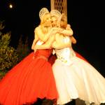 Last years Irrigation Festival royalty queen Emily Silva and princesses Brianna Cowan, Kjirstin Foresman and Shelby Wells embrace on stage after saying their goodbyes to the crowd in the Sequim High School Auditorium. Sequim Gazette photo by Matthew Nash