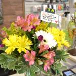 Flowers from Sofies Florist sit inside Dungeness Kids Co. where Lacey Lovell, new owner Sofies Florist, donated bouquets to show support for local businesses. Sequim Gazette photo by Matthew Nash
