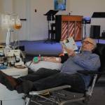Paul Pacelli donates blood at a Bloodworks Northwest drive at First Baptist Church in Sequim on March 19. Pacelli said hes been a consistent blood donor since he was 20 years old. Bloodworks Northwest representatives say theyve while seen a massive uptick on donations, local hospitals and healthcare centers need consistent donations throughout the year, in and out of times of crises. Sequim Gazette photo by Michael Dashiell