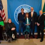 Pictured, from left, are: awards chair Janet Bruckshen; vice chair Pat Bauccio; Kevin Merrigan, Quality Inn maintenance manager; Quality Inn general manager Nancy Merrigan; Gov. Jay Inslee, and Quality Inn owner Bret Wirta. Submitted photo