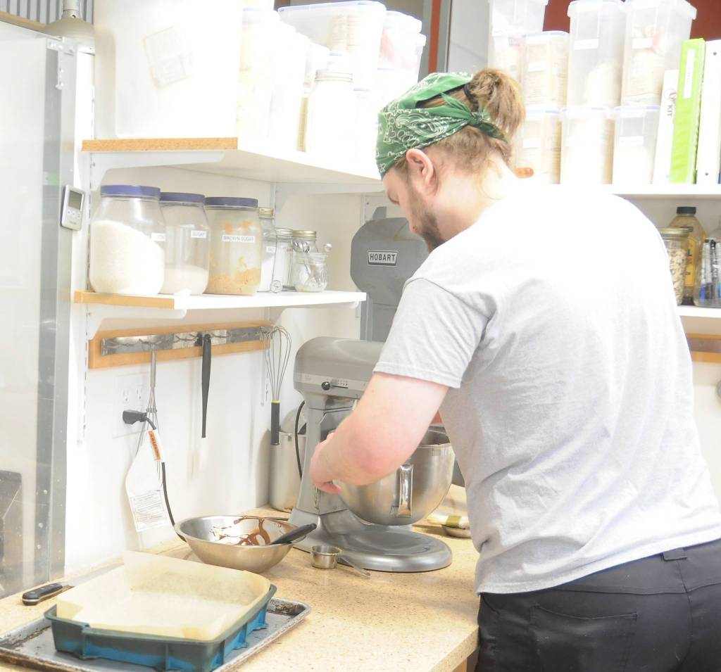 James Jackson prepares some gluten-free treats at Sequim Nourish in March 26. Sequim Gazette photo by Michael Dashiell