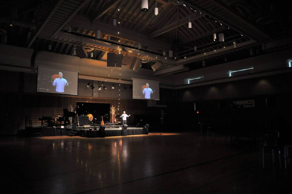 Scott Koenigseacker, lead pastor at Sequim Community Church, leads a livestream service at the church on April 5. The church had been livestreaming services for months prior to the state ban on group gatherings in March, so the transition to online services was mostly seamless, Koenigseacker said. Sequim Gazette photo by Michael Dashiell