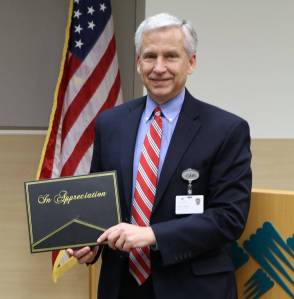 Milestone: OMC’s Lewis named ‘Community Champion’ for nonprofit support