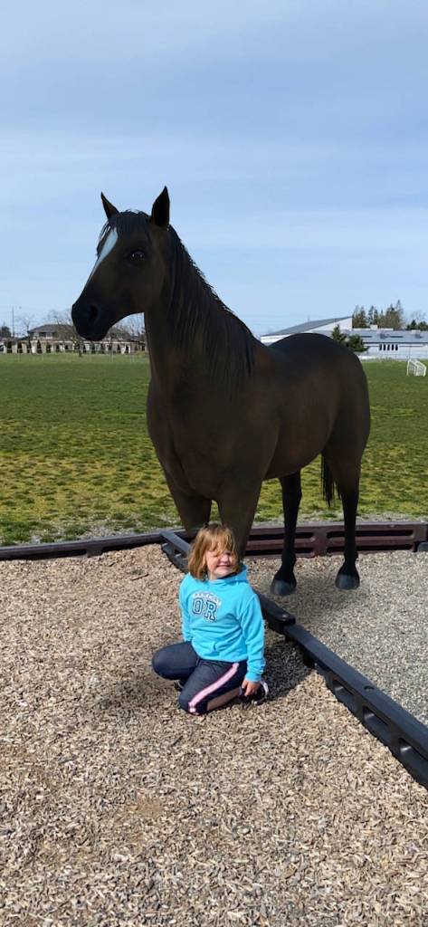 During a break, club members of the Sequim Boys & Girls Club try Googles AR Animals like six-year-old Eryn Haubrick and this horse. Children at the Sequim club have family members serving in the community as first responders, medical workers and essential workers. Photo courtesy of the Boys & Girls Clubs of the Olympic Peninsula
