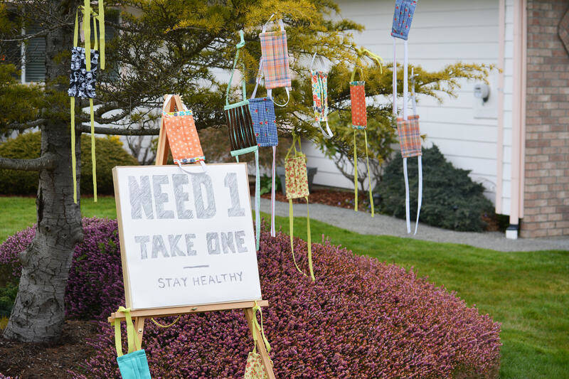 A Sunland resident sewed and hung these face masks for pick up earlier this month. Family members said in just eight days residents have taken up her offer for hundreds of masks. Photo courtesy of Linda Carlson