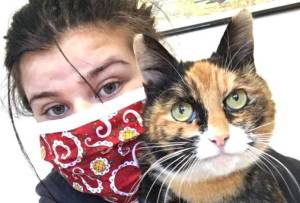 Jessica Dowe, a Olympic Peninsula Humane Society staff member, holds OPHS resident Lulu. Photo courtesy of Olympic Peninsula Humane Society