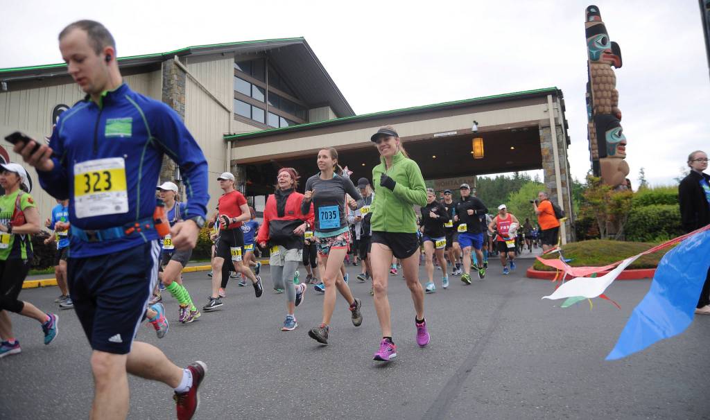 Runners break from the start of the 2017 North Olympic Discovery Marathon at 7 Cedars Casino in Blyn. This years event, NODMs 18th, has been moved to virtual races with concerns of large group gathering exacerbating the novel coronavirus threat. Sequim Gazette file photo by Michael Dashiell