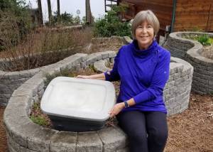 Master Gardener Judy Mann, pictured here with her worm bin, has been enjoying the vermicompost her worms have produced for more than 10 years. She offers a Worm Composting presentation on April 23. Photo courtesy of Judy Mann