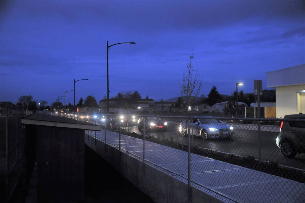 Cars line up on West Fir Street for their turn at honking support for prep spring sports athletes on April 17. Sequim Gazette photo by Michael Dashiell