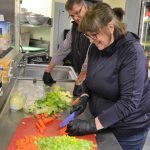 Barbara and Mike Lippert prep vegetables for soups to be delivered to apartment complexes from the Sequim Boys & Girls Club. They were some of the first volunteers to step up to help prepare soups for local apartment complexes. Sequim Gazette photo by Matthew Nash